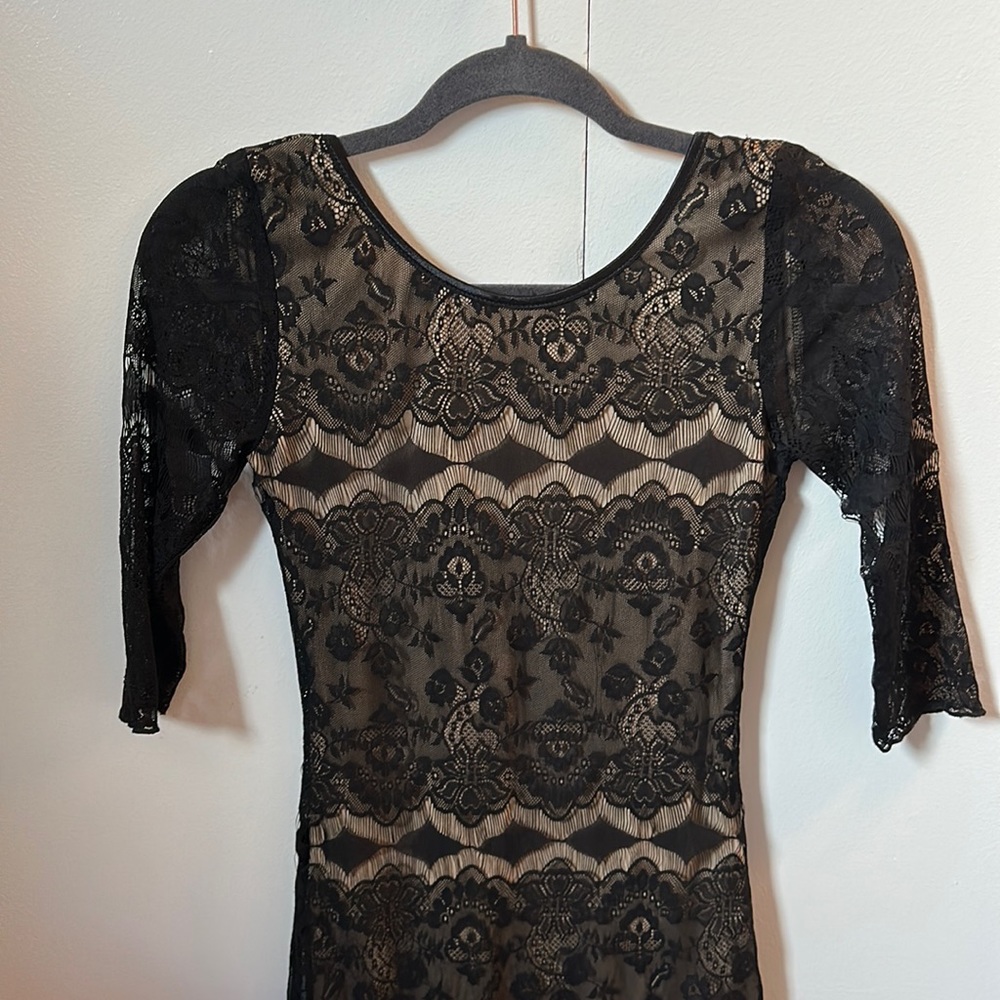 Lace mini dress with cream slip underneath